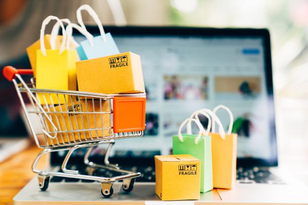 paquetes-productos-bolsa-compra-carrito-portatil-concepto-compras-entrega_38716-138